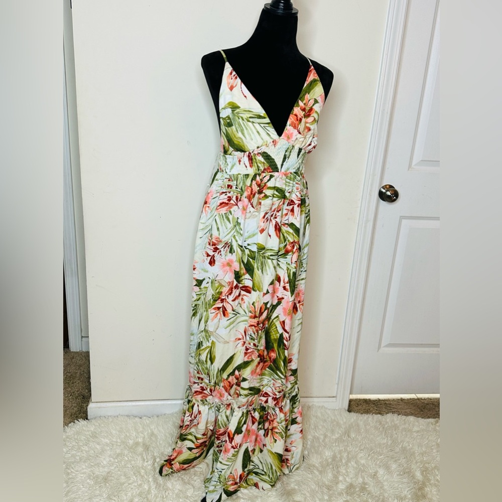 New Never worn: Floral Maxi Dress with cris cross spaghetti strap back.